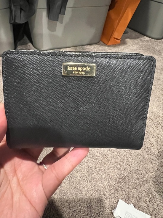 kate spade Accessories - kate spade black Saffiano leather bifold wallet with gold logo plate